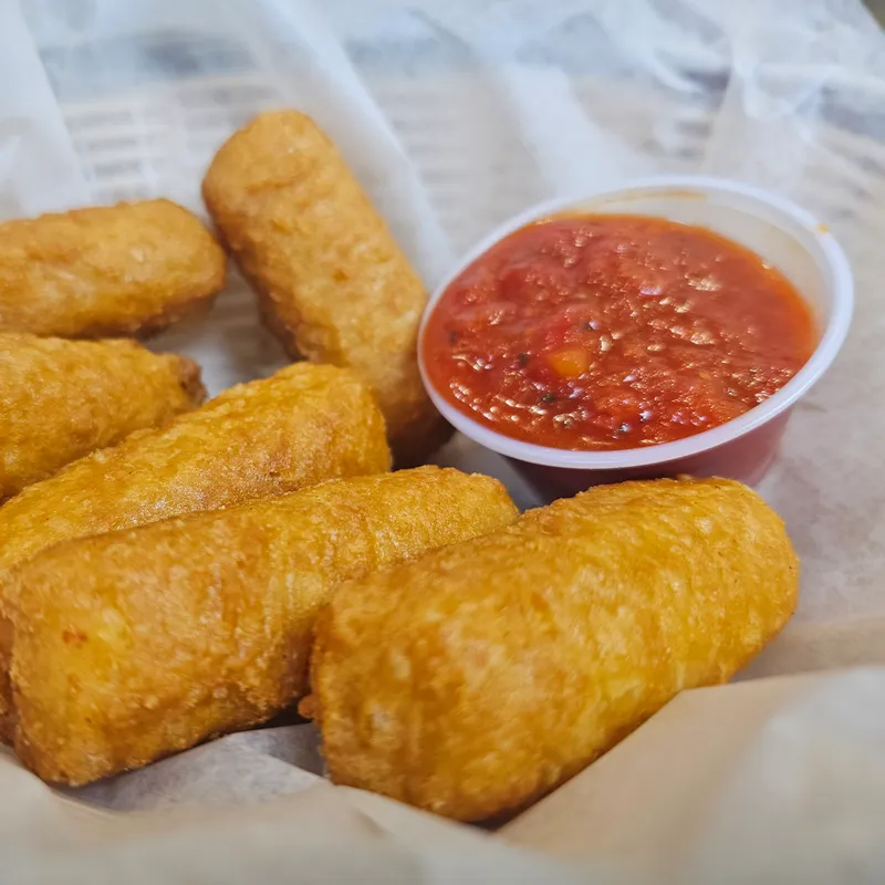 Golden mozzarella sticks with marinara