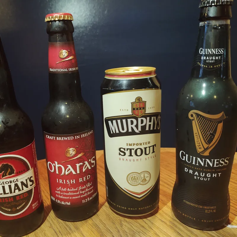 Bottled beers lined up on the bar